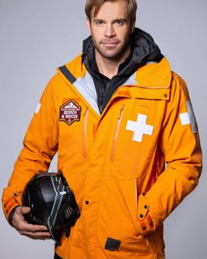Chris Love in Glacier National A National Park Romance Stephen Huszar Orange Hooded Jacket